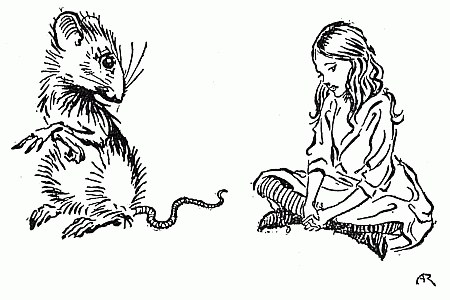 The Mouse sits up on its haunches, its long tail curled along the ground, while Alice sits cross-legged facing it, listening with her head bowed.