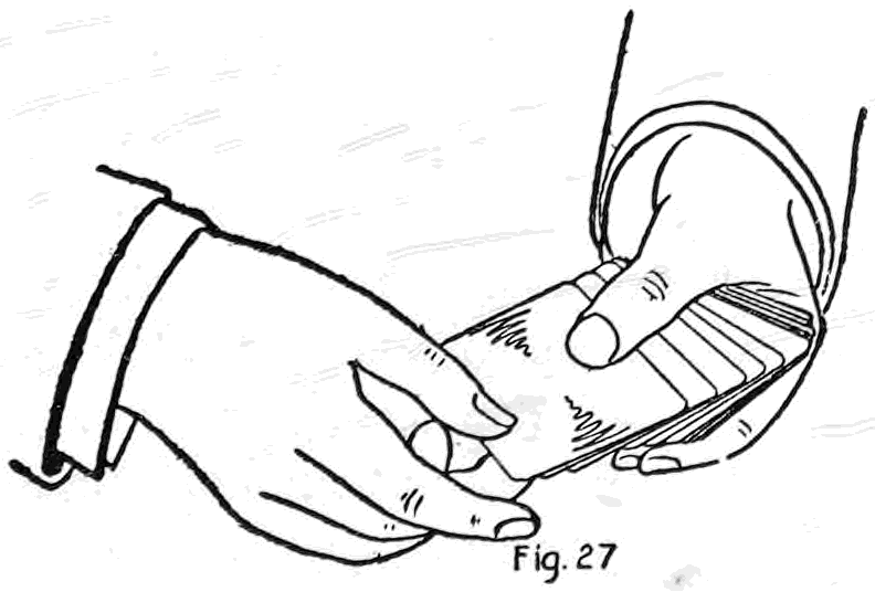 Fig. 27. — The second method of second dealing: the left thumb has pushed several cards forward, each a little in advance of the other, and the right hand takes the protruding second card.
