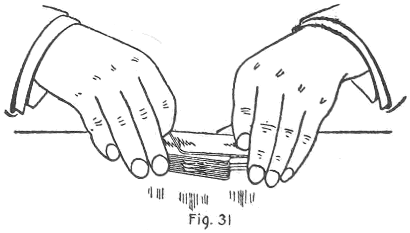 Fig. 31. — The left hand draws off the top packet and with the same movement slides out the jogged cards, dropping them on the table, while the right hand holds the rest of the deck for the running cut.