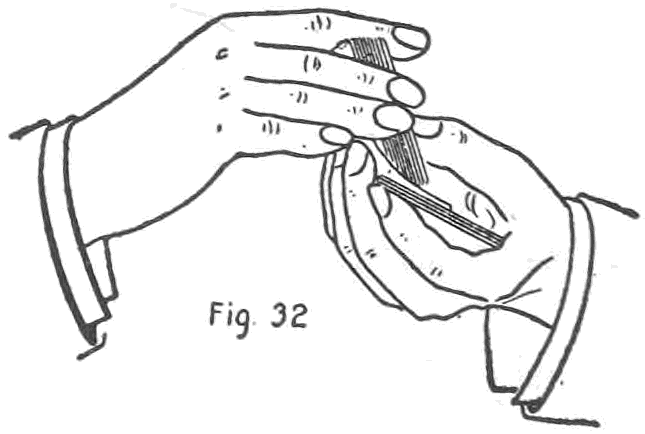 Fig. 32. — The right hand, holding the deck by the ends, shuffles over the left, while the left second and third fingertips, protruding beneath the packet, draw off the bottom card into the left hand.
