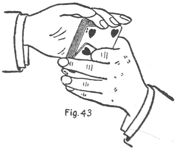 Fig. 43. — Replacing the bottom palm: the right hand lays the deck by its ends into the left hand, where the palmed cards lie face out along the left fingers, first finger curled underneath.