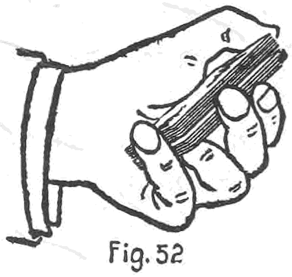 Fig. 52. — Erdnase shift, one hand: the left hand alone holds the deck, little finger at one end, thumb across the top and fingers at the side, where the second fingertip holds a break.