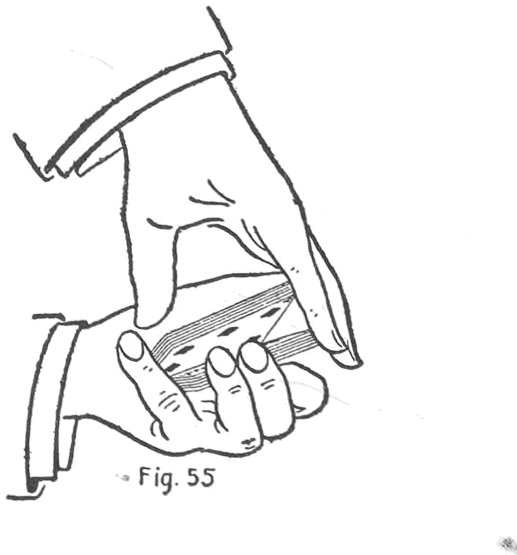 Fig. 55. — Erdnase shift, two hands: the right hand covers the deck, its little fingertip in the break pressing down the corner of the under packet as the left first finger presses it out and up.