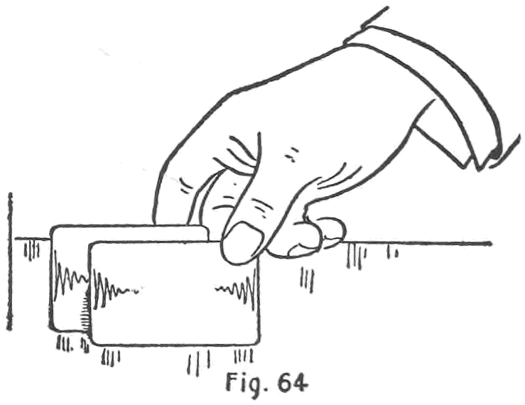 Fig. 64. — The thumb carries the table card away to the left against the second finger while the first fingertip turns over the card beneath.