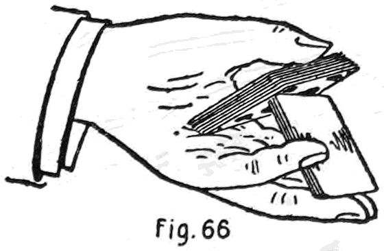 Fig. 66. — The first finger has pushed the fallen portion up against the left thumb, and the upper portion is tilting past its upturned side, ready to drop into the palm beneath it.