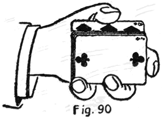 Fig. 90. — The thumb has returned across the top, pressing the diamond card down beneath the deck; a club now shows on the face.