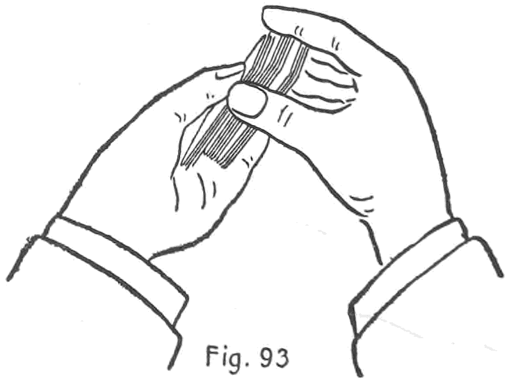 Fig. 93. — The First Method: the right hand lifts its portion in the hand shuffle and, between the third finger and thumb, secretly brings up the lower packet that was left in the left hand.