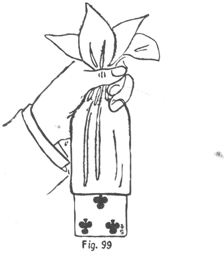 Fig. 99. — The Card and Handkerchief: the right hand holds the deck suspended in the gathered folds of the handkerchief, and the selected card, the five of clubs, emerges at the lower end.