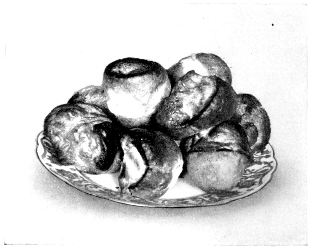 Pop-Overs. — A heap of Pop-Overs on a patterned plate, puffed high with crisp, split and hollow tops.