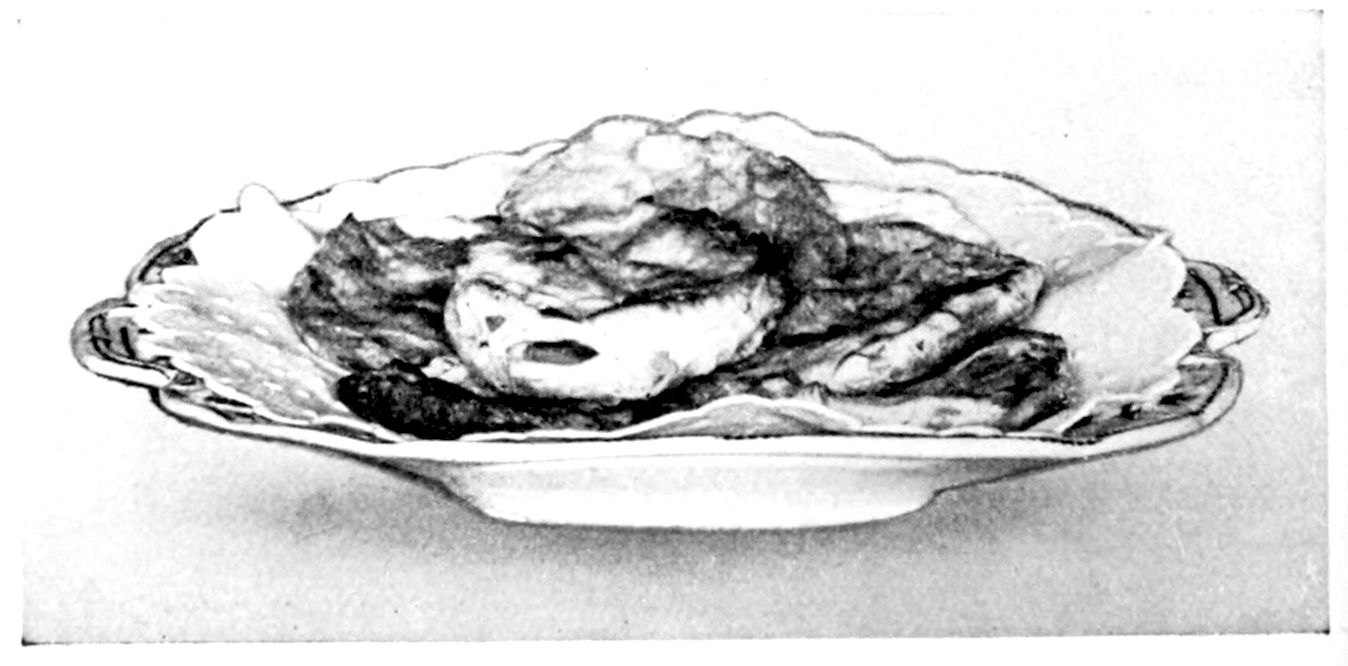 Souffléd Crackers. — Split crackers baked until puffed, blistered and browned, piled on a scalloped plate.