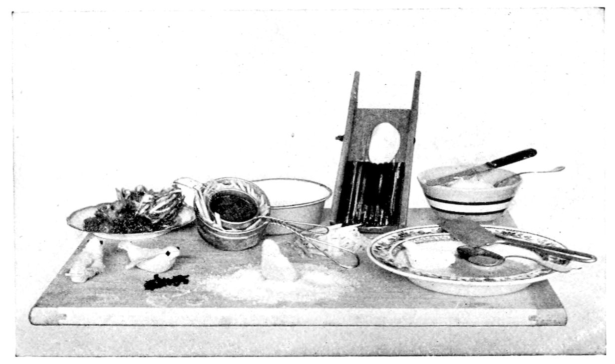 Potato Nests. Potatoes, Somerset Style. — A board with the tools for both dishes: a potato slicer with a corrugated blade, two nested wire strainers, a nest filled with small fried fish, and potato birds with clove eyes beside a heap of crumbs.