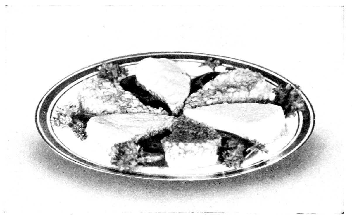 Russian Cutlets. — Six wedge-shaped cutlets radiate from the centre of a round silver platter like the spokes of a wheel, pale force-meat alternating with the grainy pilaf side, with dark sauce and parsley between them.