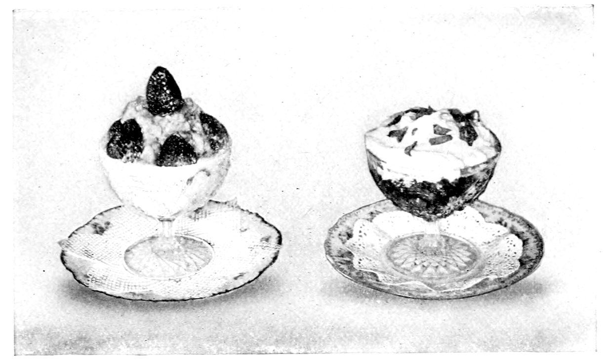 Coup Sicilienne. Coup a l’Ananas. — Two stemmed glasses on doily-lined saucers: the left heaped with ice and topped with whole strawberries, the right with fruit below and ice cream above, dotted with small candied pieces.
