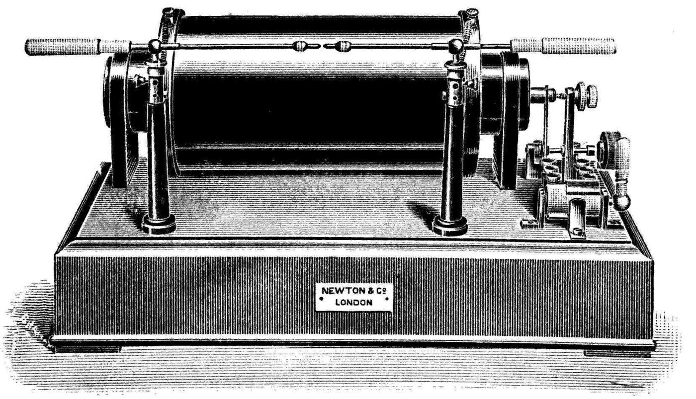 A 10-inch induction coil for wireless telegraphy. The primary winding lies on a bundle of fine iron wires inside an ebonite tube; over it goes the secondary, which may run to many miles of fine silk-covered wire. Its rating is simply the length of spark it will throw.