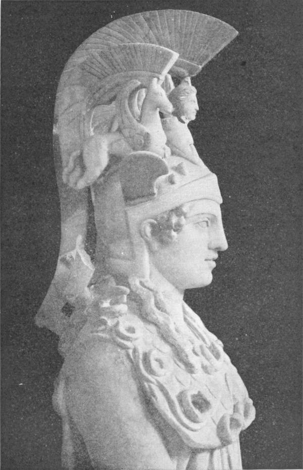 Athene of the Parthenon. Photo: Alinart — A marble head and shoulders of Athene in profile, wearing a tall crested helmet carved with a sphinx and winged horses, with snakes coiled about her breast.