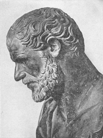 Aristotle. From Herculaneum, probably Fourth Century B.C. Photo: Dr. Singer — A bronze head of an elderly bearded man in profile, his head bent forward and his hair in close waves.