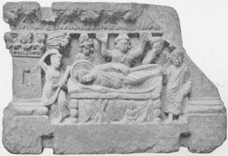 The Death of Buddha. Græco-Buddhist carving from Sivat Valley, N. W. Province, probably A.D. 350. India Mus. — A carved stone panel of the Buddha lying on a couch, with mourners around him, some raising their arms in grief, and a small seated figure beneath the couch.
