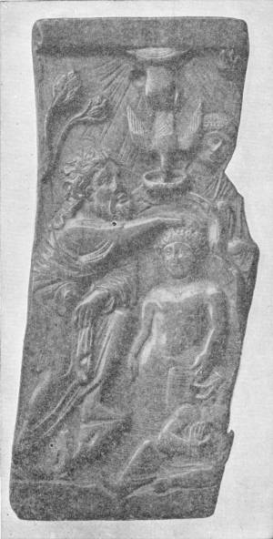 The Baptism of Christ. (Sixth Century Ivory Panel in the British Museum) — A tall carved ivory panel shows a bearded man laying his hand on the head of a small naked figure, while a dove descends upon him out of rays of light from above.