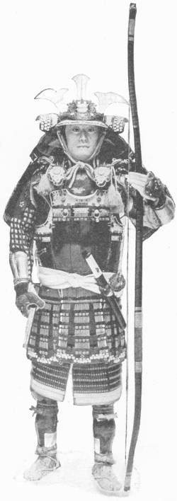 Japanese Soldier of the Eighteenth Century. (In the Victoria and Albert Museum) — A full suit of Japanese armour, with a horned and crested helmet, laced plates and a sword at the waist, stands holding a tall bow.