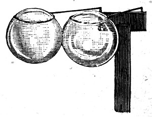 Two bubbles on rings, resting against one another but not touching.