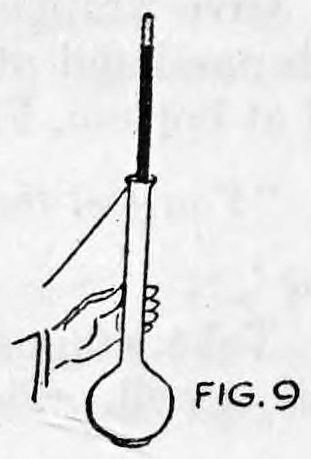Fig. 9. — The wand rises out of the round vase as a hand holds the vase and the thread is pulled taut up and to the left.