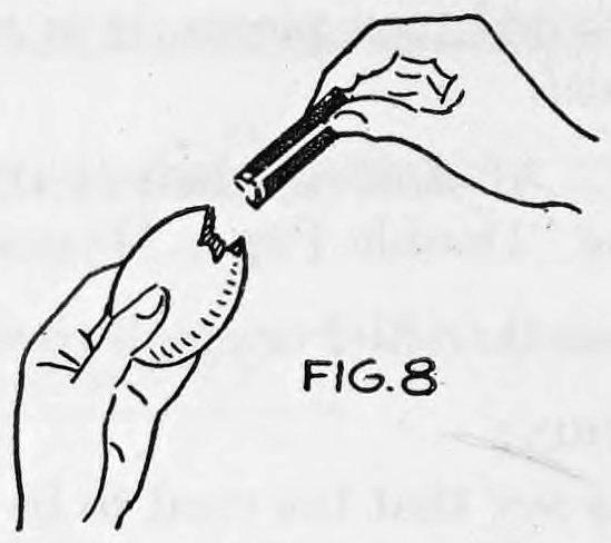 Fig. 8. — One hand holds the egg with its shell broken at the top while the other hand reaches in and draws out the rolled card.