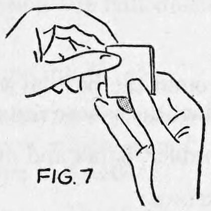 Fig. 7. — The right hand holds the folded paper while the left hand takes the upper part, letting the coin slide out into the right hand.