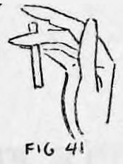 Fig. 41. — Right fingers curved inward to the palm of the hand with the cigarette hidden.