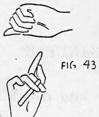 Fig. 43. — The same hands seen from the rear, away from the audience, with the cigarette gripped behind the closed left hand.