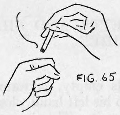 Fig. 65. — Broken cigarette being placed into the closed left hand and into the Thumb Tip, the right hand below.