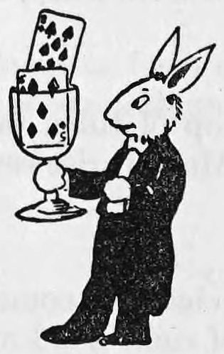 A rabbit in a tailcoat stands upright holding a goblet with playing cards standing in it, a small tailpiece decoration.