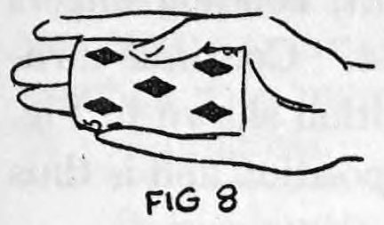 Fig. 8. — The right hand seen from the back with the card pushed down into the palm by the tips of the second and third fingers.