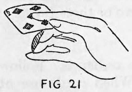 Fig. 21. — The outer card pushed upward a little by the thumb, its lower corner released from the little finger.