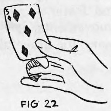 Fig. 22. — The cards held by the thumb pressed on the second finger, with the first finger raised and placed behind the top card.