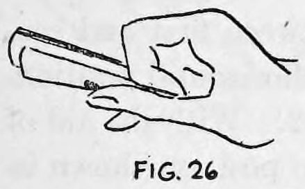 Fig. 26. — The index finger pushed between the outer card and the other four, gripping the outer card against the thumb.