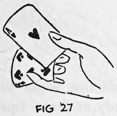 Fig. 27. — The outer card, an ace of spades, held up with its lower corner released from the little finger.