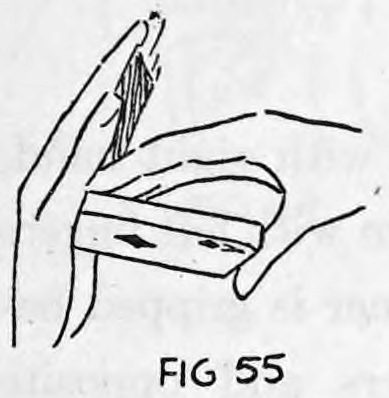 Fig. 55. — Under cover of the left hand, the right hand turns so the back-palmed card passes into the left palm.