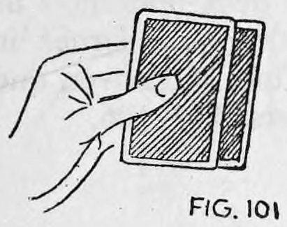 Fig. 101. — View as you see the cards: the left hand holds the deck with two cards extending a little to the right at the bottom.