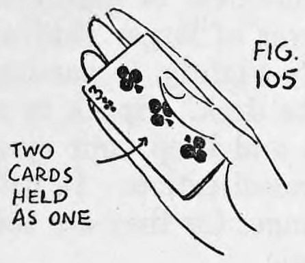 Fig. 105. — The right palm holds two cards as one, lower corner in the crotch of the thumb, with an arrow and the label two cards held as one.