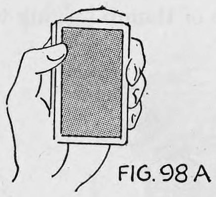 Fig. 98A. — A second view of the left hand holding the deck face down, first finger at the outer narrow edge and fingers curled at the right side.