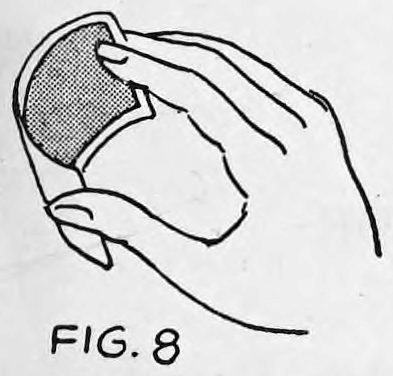 Fig. 8. — The card bent in the right hand, the fingers gripping its outer narrow end with the thumb on the opposite end, ready to snap loose.