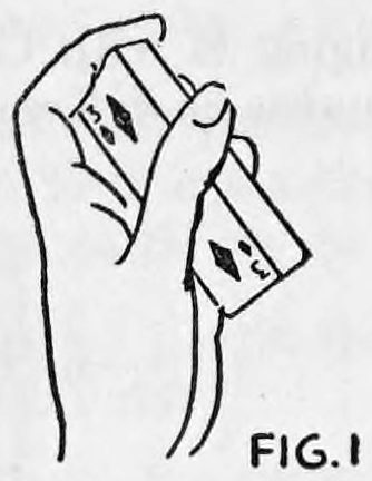 Fig. 1. — The left hand holds the deck on end with the faces of the cards toward the rear, the thumb along the upper edge.