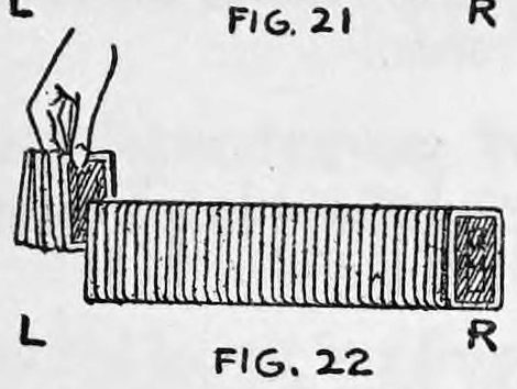 Fig. 22. — The same spread row, with a hand lifting a few cards from the L end while the arranged cards stay together at the R end.