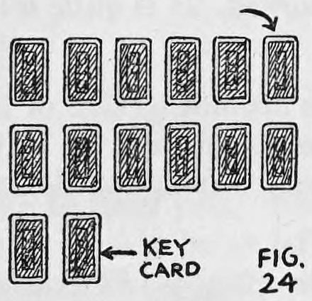 Fig. 24. — Cards dealt face down in two rows of six, with a third row of two begun; an arrow marks the second card of the third row as the key card.