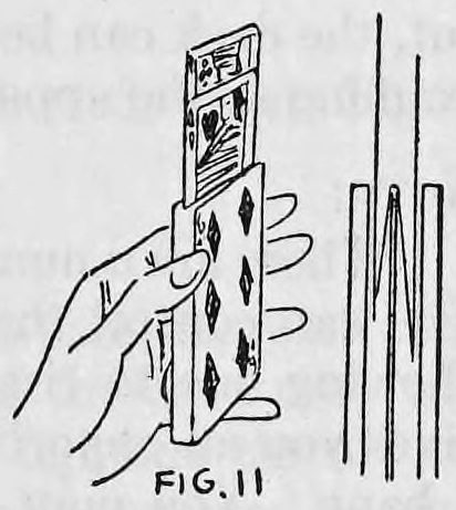 Fig. 11. — The left hand holds the deck with the King rising first above the others, shown beside a side view of the two prepared cards and the rubber band.