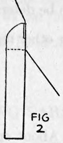 Fig. 2. — Front view of the card case with the black thread passing over the extra card and running down diagonally to the side.