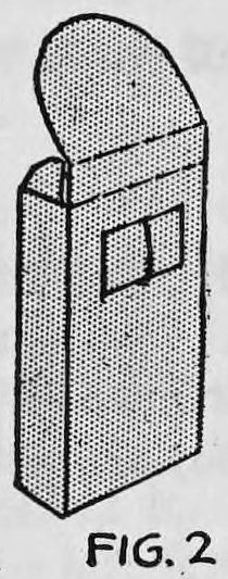 Fig. 2. — The prepared card case with its flap open, shaded gray, showing a small rectangular piece of tin glued over the hole on the front.