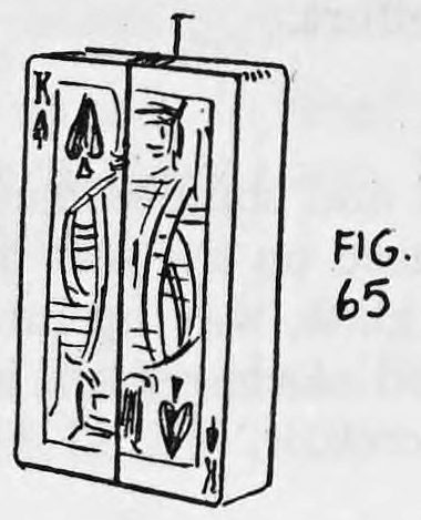 Fig. 65. — The finished threaded deck seen from the front, a king of spades facing out, with the thread coming up from the top of the deck.