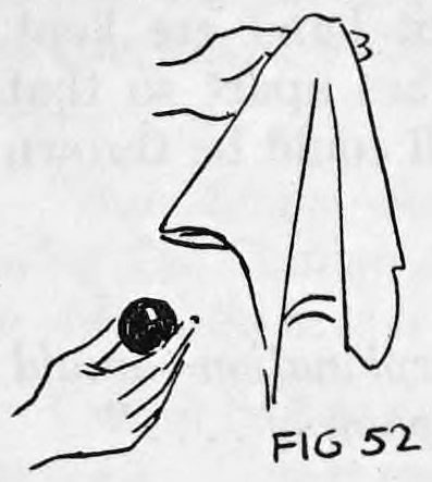Fig. 52. — A hand at lower left holds a ball between its fingers while the silk handkerchief hangs from the other hand above it, showing the silk carried away alone.