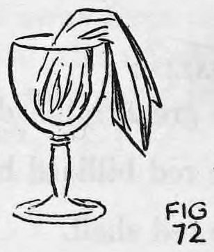 Fig. 72. — A goblet with the silk-wrapped ball inside and part of the silk hanging out over the rim.